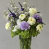 The Dandelion arrangement feels wild, soft and a little untamed like something