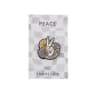 Enamel pin with a peace sign and flowers on a backing card
