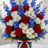 This elegant arrangement blends classic romance and cool serenity with a striking