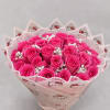 Bouquet of bright pink roses wrapped in Hello Kitty paper
