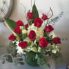 Red roses, white hydrangea, kale flower, decorated with nice greenery in a