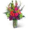 Colorful mixed bouquet in a clear glass vase