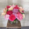 (ALL-ROUND) A cheerful, full arrangement of soft pinks and blush tones, featuring