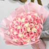 100 long-stem pink and white roses with decorative wrapping paper. One hundred