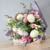 Celebrate seasonal beauty with a textured, romantic arrangement designed in our signature