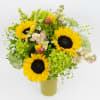 Sunflower bouquet with green hydrangeas and small white flowers in a vase