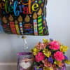 Birthday balloon with a flower bouquet and teddy bear gift box