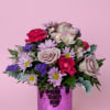 A cheerful, feminine arrangement that reads like a celebration in pinks and
