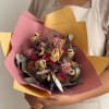 A romantic, rustic mix of dried roses and textured blooms, this Sun