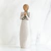 A quiet keepsake with a soft, hand-carved feel, this Willow Tree Hero