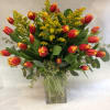 These striking ombre tulips are complimented by solidago and seeded eucalyptus in
