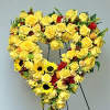 The forever sunshine heart is an array of beautiful bright yellow roses