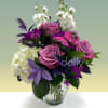 Soft lavender roses and lush white‑green hydrangeas create the first impression of