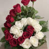 Bouquet of red and white roses with greenery
