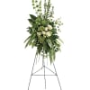 Tall white rose standing spray on an easel with greenery