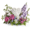 A heartfelt tribute to a cherished life, Remembering Love Bouquet surrounds the