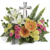 A radiant celebration of faith, this bright bouquet of cheerful orange and