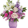 Add a touch of elegance and charm with Teleflora's Whimsical Blooms bouquet