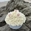 White rose bouquet with white orchids in a round vase