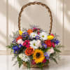 A lively, garden-style basket that reads like a sunlit patch of flowers-perfect