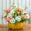 Make a dramatic and unforgettable statement with the spring basket, arrangement designed