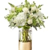 Elevate any occasion with our lush floral arrangement featuring   green