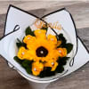 Beautiful yellow bouquet, a sunflower and around yellow roses each one brings