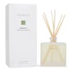 Fragranced diffuser bottle with reed sticks beside its box