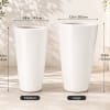 Two tall white tapered planters shown side by side with size labels.