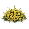 Yellow floral arrangement with roses, lilies, and daisies