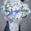 A dreamy Korean-style bouquet featuring soft blue and white roses, elegant white