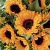 Bouquet of orange sunflowers with yellow filler flowers