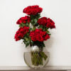 Bouquet of red roses in a clear glass vase