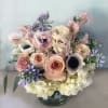 Elegant, ethereal arrangement of breathtaking dusty blush, sandy, coral colors. in Norse