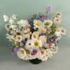 Stunning beauty in this luxe, large arrangement in muted colors of dusty