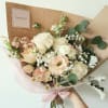 Hand-held Bouquet
The bouquet shown in the photo is our Standard Size, wrapped