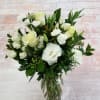 Select this pure white combination of flowers in a clear glass vase.