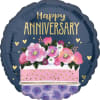 Round anniversary balloon with pink flowers and gold lettering