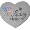 Heart-shaped memorial plaque with floral print and the words In Loving Memory