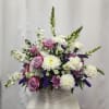 Offer comfort and heartfelt condolences with the Lavender Serenity Basket, a beautifully