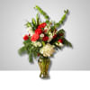 Red and white mixed bouquet in a glass vase