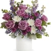 Pink roses and white daisies in a white vase