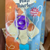 Packaged purple rail twirler toy with metal rods and blue handle