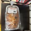 Wrapped cranberry orange sweet bread in a foil tray