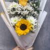 A cheerful hand-tied bouquet of bright sunflowers and sweet white daisies &mdash;