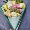 Bouquet of pink and white roses with a rhinestone "Happy Birthday" pick