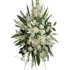 "This beautiful spray includes white hydrangea, white roses, white oriental lilies, white