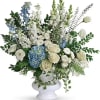 A treasured tribute for your beloved, pure whites, ivory and sky blues