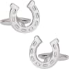 Pair of silver horseshoe cufflinks on a white background