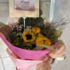 Luxury sunflower and rose bouquet handcrafted with fresh premium flowers by Snyder